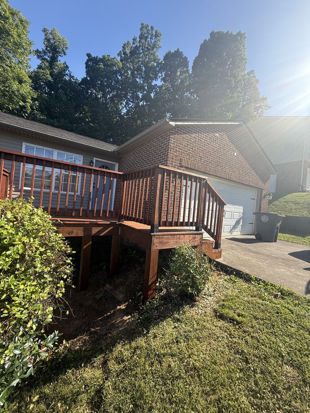 Completed Red Mahogany deck staining project in the sun, SuperDeck Exotic Timber Oil — Kingsport, TN