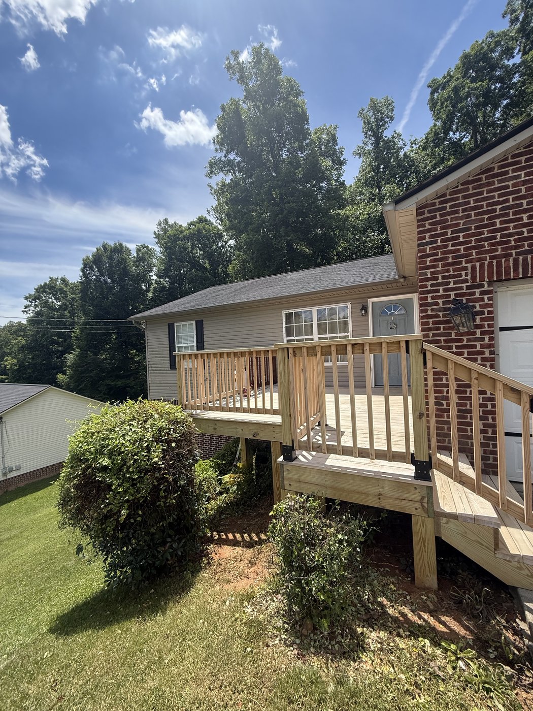 New pressure-treated pine deck before staining, full view — Kingsport, TN