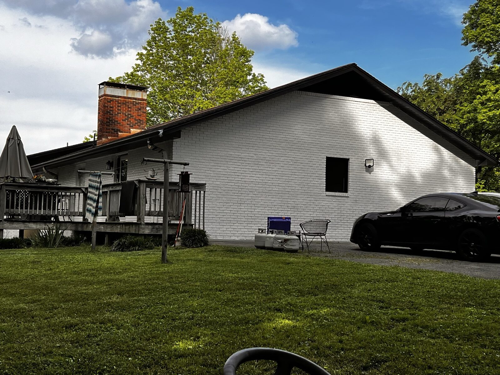 Tri-Cities Romabio brick painting project with the chimney still red